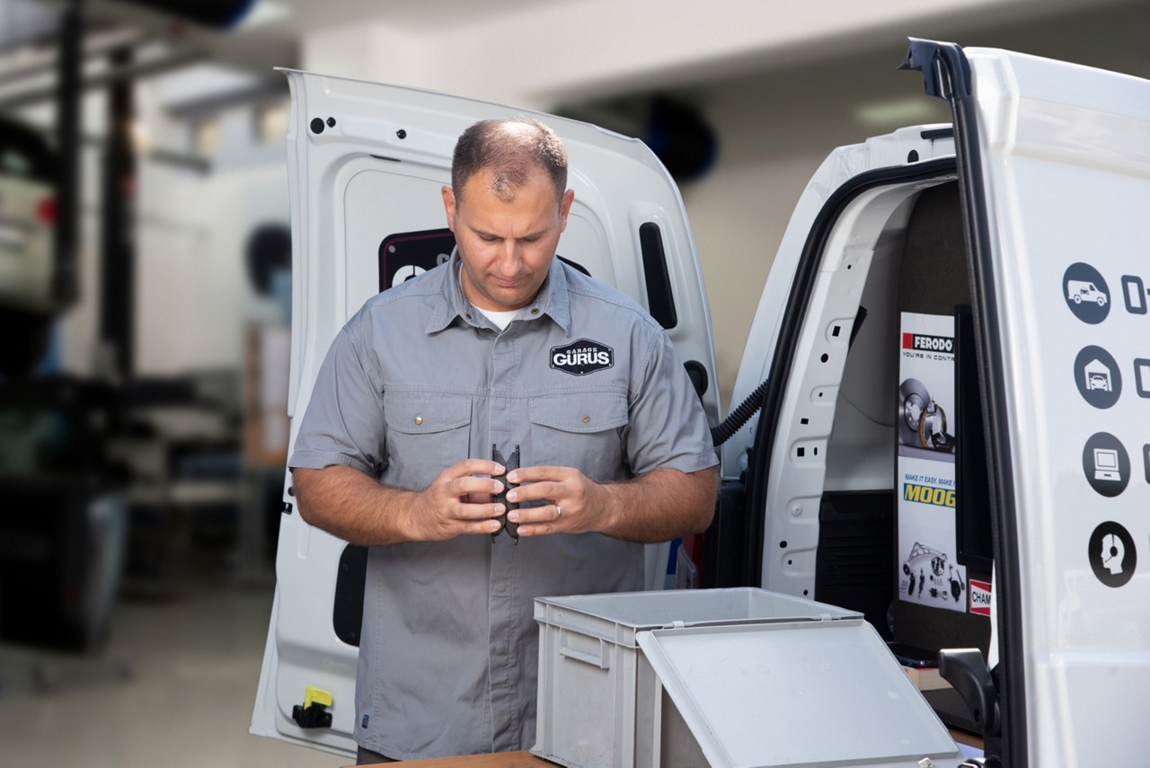 Warranty process Garage Gurus checking brake pads for a warranty claim