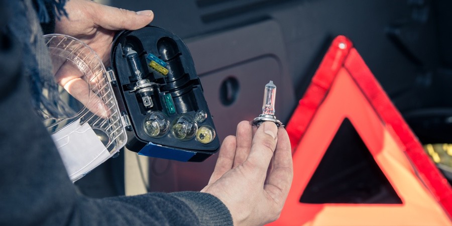 Mechanic-Changing-Car-Headlights Mechanic-Changing-Car-Headlights