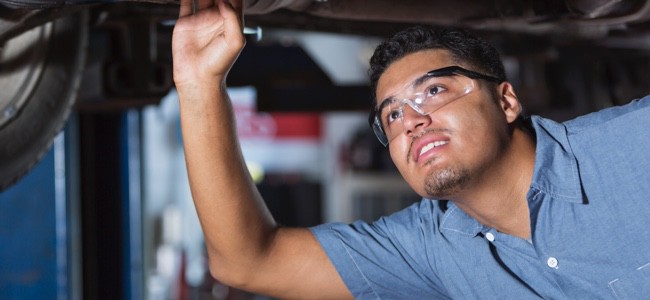 Mechanic-Inspecting-Car-Undercarriage