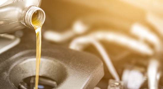 Pouring-Oil-Into-Car-Engine