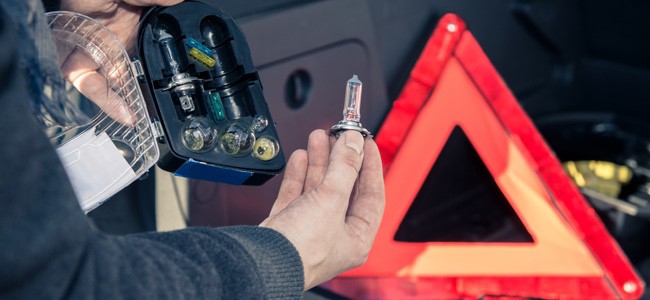 Mechanic-Changing-Car-Headlights