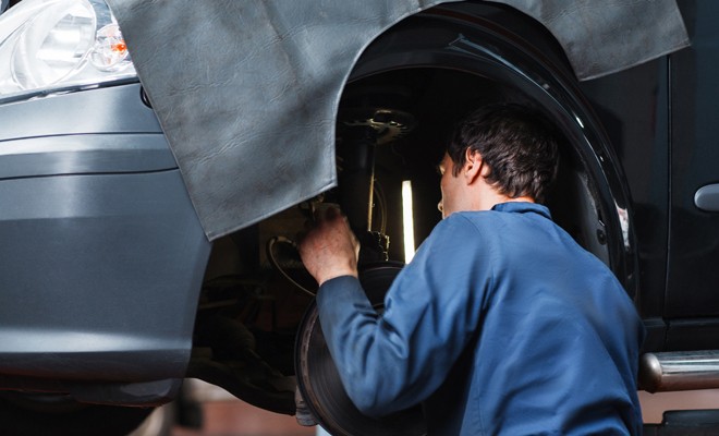 mechanic-working-on-suspension