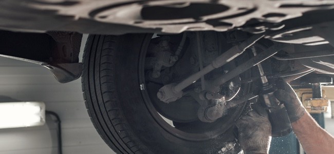 Mechanic-Working-Under-Vehicle